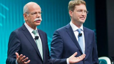 Ola Kallenius, right, stand with Daimler Chairman Dieter Zetsche